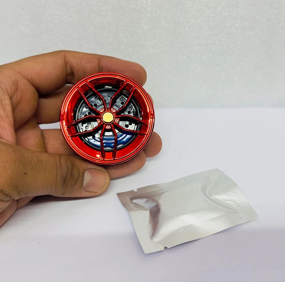 VeloSpin™ – Spinning Alloy Wheel Car Perfume